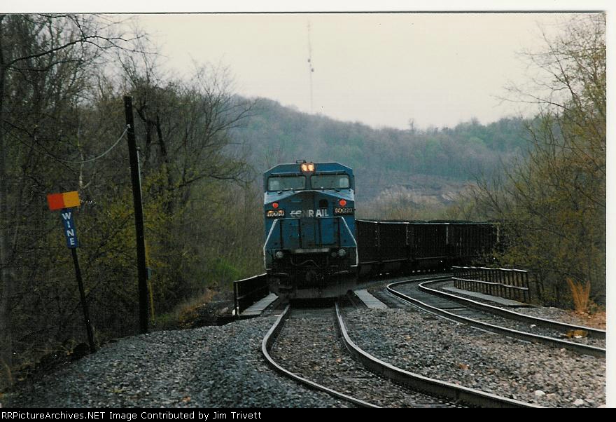 CR 6099 waits with a loaded train at WINE, north end of Hobson